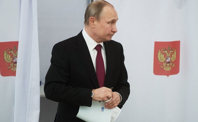 Путин проголосовал на выборах президента в РФ - (ВИДЕО)