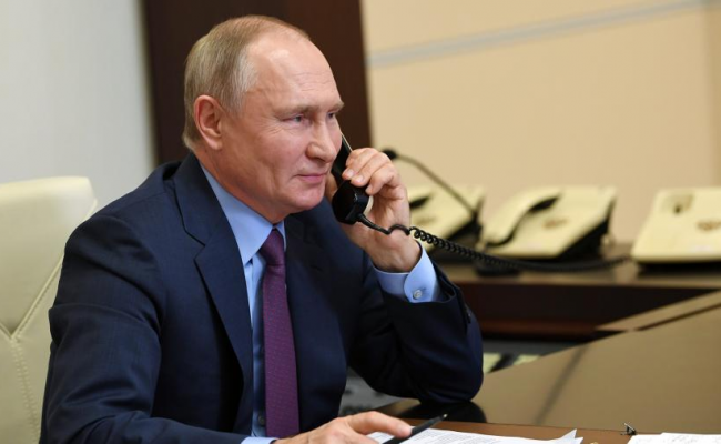 Путин по телефону обсудил с Макроном и Меркель конфликт в Украине